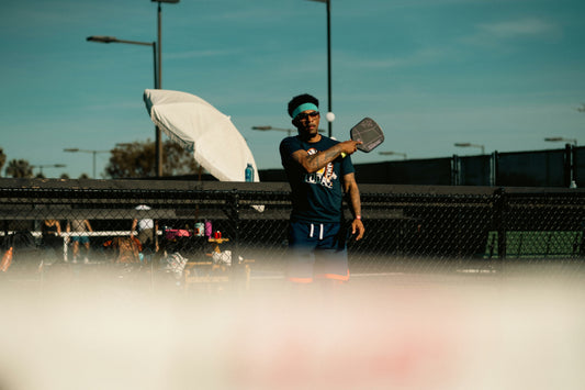 A Man is playing Pickleball in Malaysia - Arronax